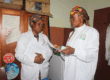 Dr Glwadys Cheteug from CRID revising the SOPs with Rev. Sister Tata Relindis, matron of the St Joseph's clinic